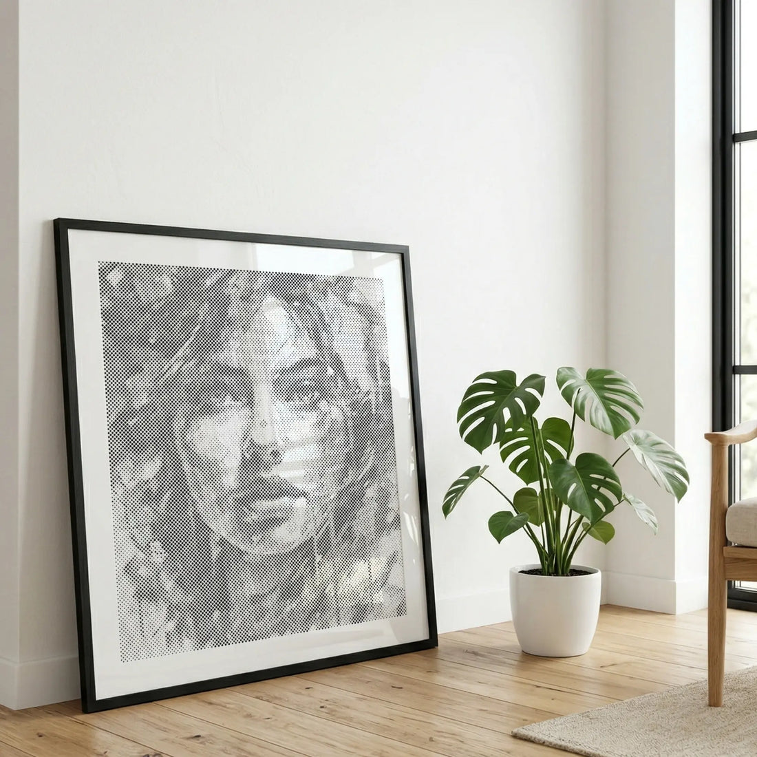 Une peinture par points finie, exposée comme décoration murale dans un intérieur calme