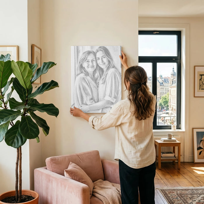 Une peinture par points personnalisée de proches, exposée à la maison