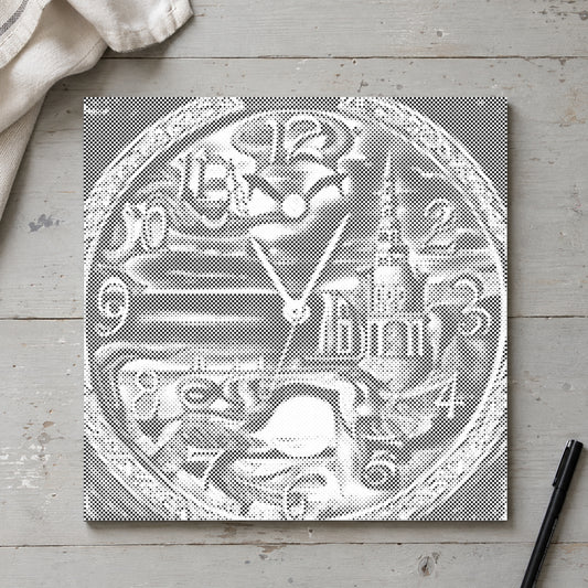 Toile de peinture par points “Horloge murale abstraite”, vue du dessus sur une table de travail à la lumière douce du jour.