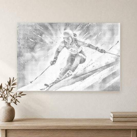 Toile de peinture par points représentant un skieur alpin, exposée au-dessus d’une console en chêne clair.