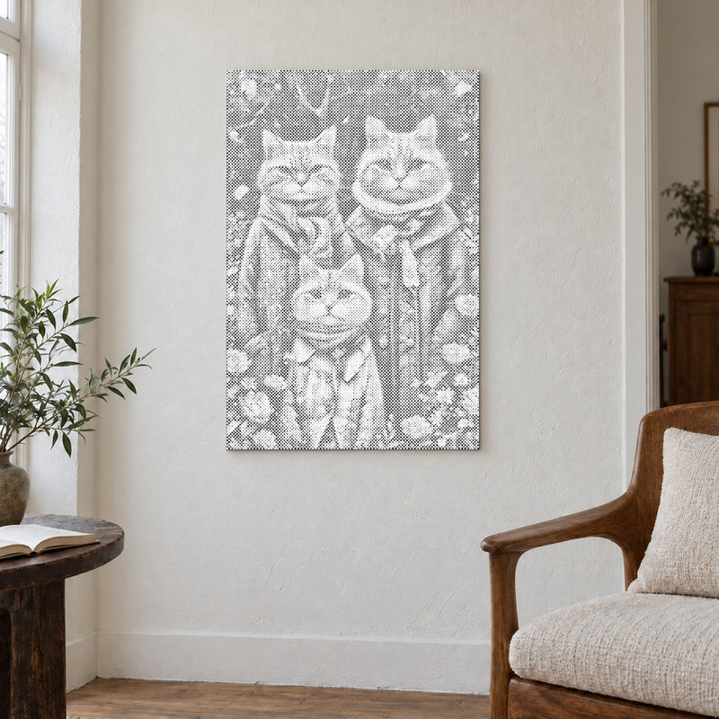 Toile de peinture par points “Famille de chats”, sur un mur clair dans une pièce baignée d’une lumière douce.