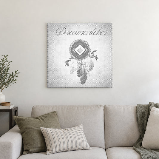 Toile de peinture par points “Attrape-rêves avec plumes”, sur un mur clair dans une pièce baignée d’une lumière douce.