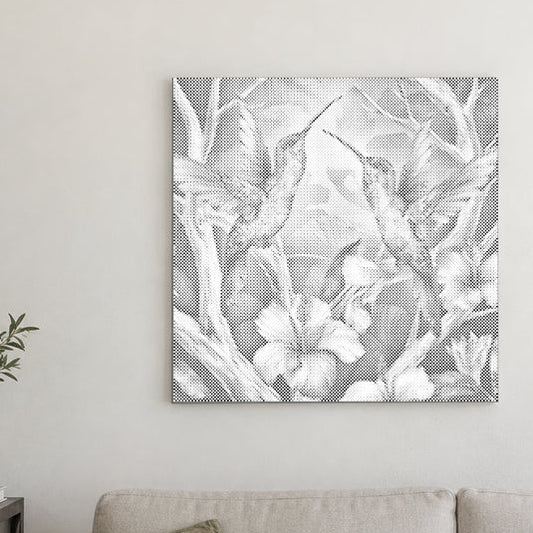 Toile de peinture par points “Colibris parmi les fleurs”, sur un mur clair dans une pièce baignée d’une lumière douce.