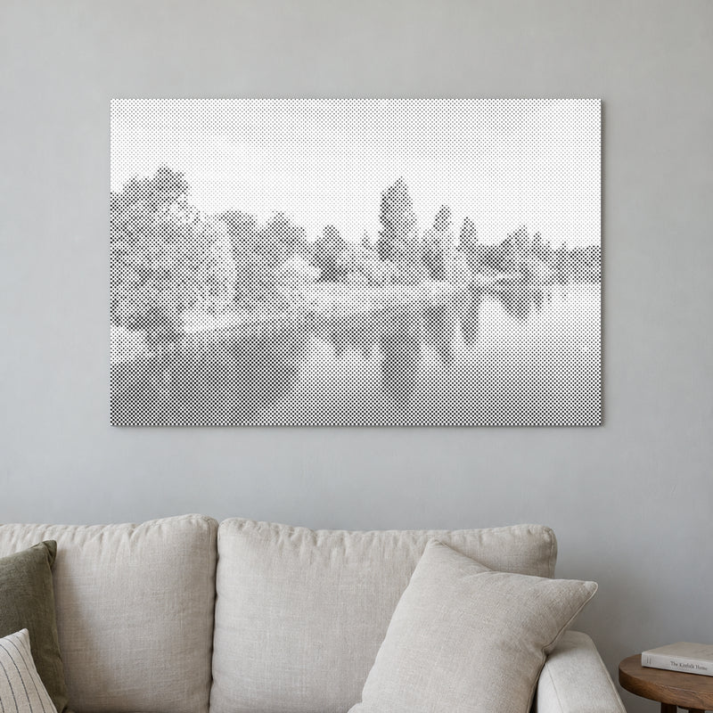 Toile de peinture par points “Hyde Park à Londres”, sur un mur clair dans une pièce baignée d’une lumière douce.
