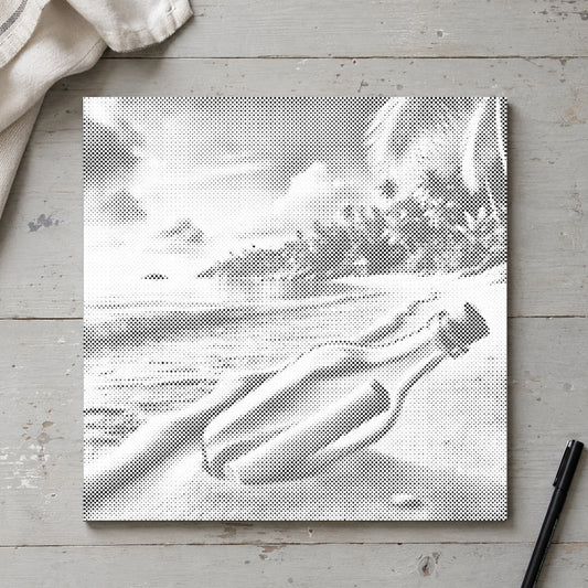 Toile de peinture par points “Message dans une bouteille”, vue du dessus sur une table de travail à la lumière douce du jour.