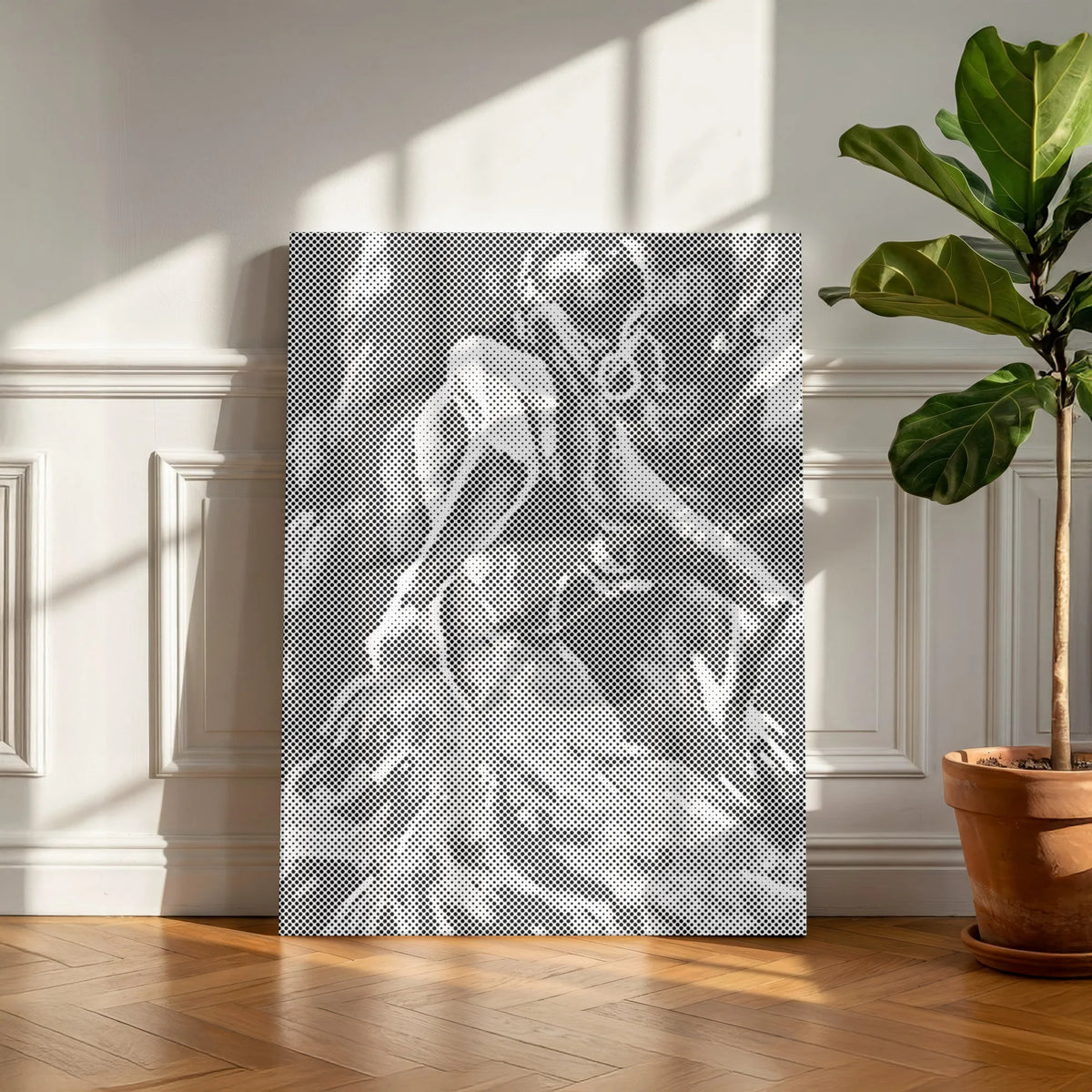 Poésie en mouvement, tableau de danseuse en peinture par points sur une toile sans bordure blanche devant un mur crème mouluré.
